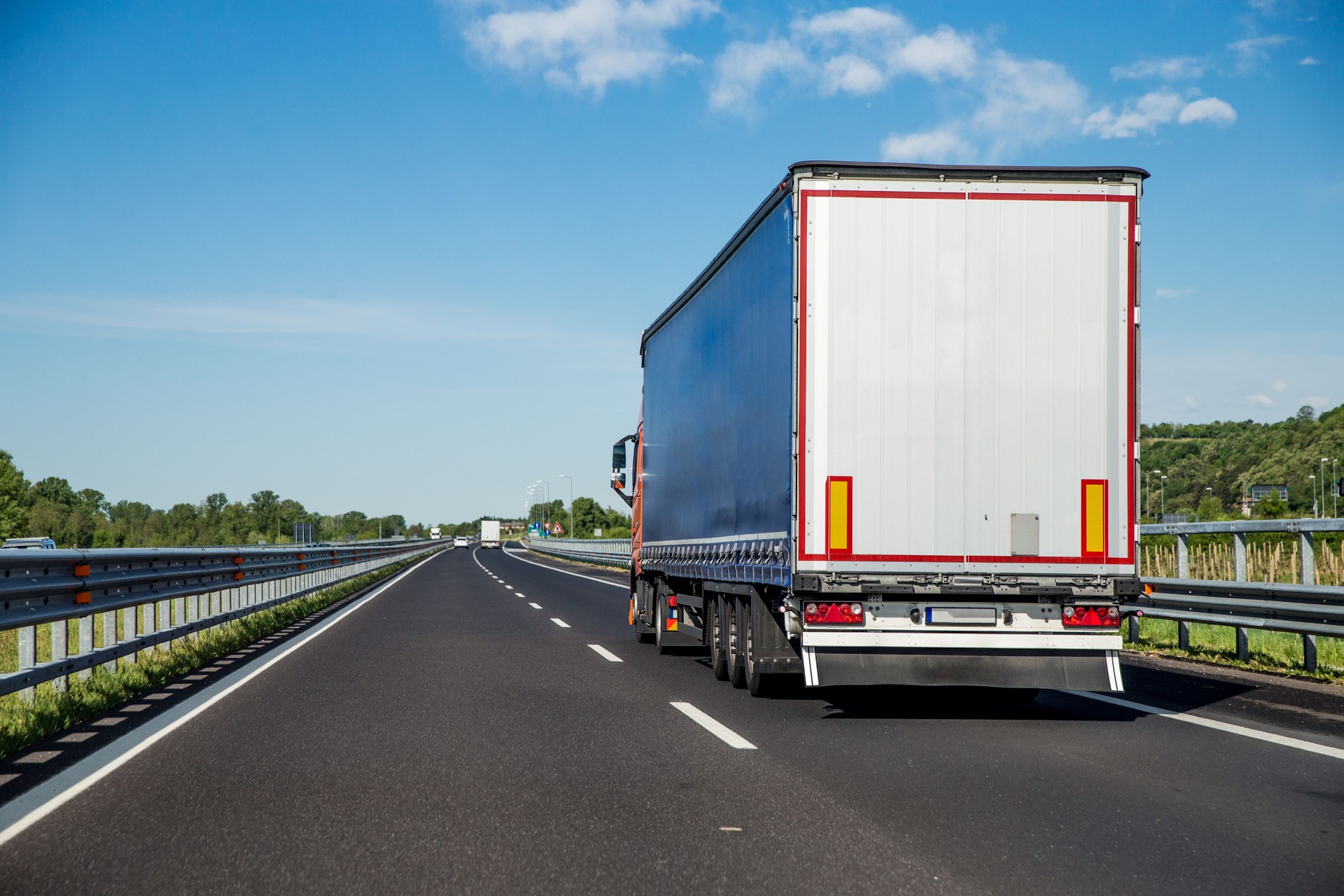 Refrigerated Truck driving on Highway